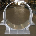 Custom pipe saddles with guide support and stainless setel slide plate