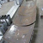 Custom pipe saddles fresh from fabrication