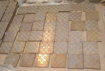 Image of many bronzphite based slide plates
