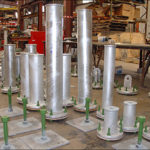Adjustable Base Supports and Flanged Trunnions for Cold Piping